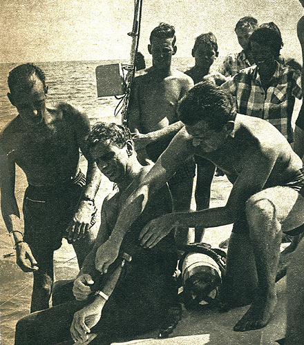 The guys peeled off my wetsuit that was compressed to paper thinness and my skin was pickled by the brine