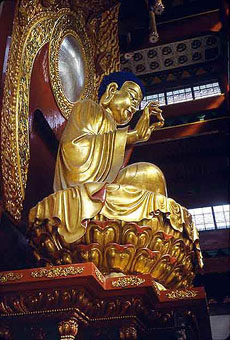 Great Buddha Seated on Sylized Lotus- Lingyin Si Shrine in Hangzhou China © Rolf Gross